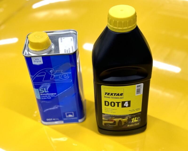 Two bottles of brake fluid from ATE and Textar