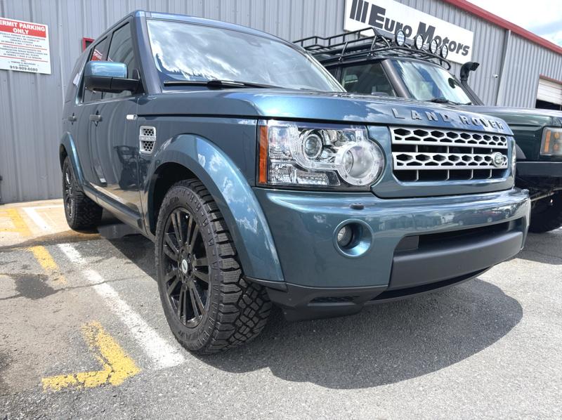 Front angle of teal land rover lr4