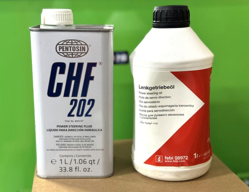 Two bottles of power steering fluid from Febi and Pentosin