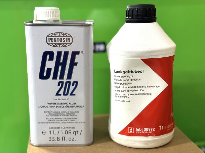 Two bottles of power steering fluid from Febi and Pentosin