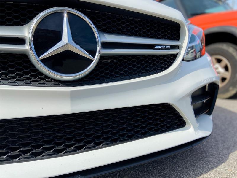 Front grill of white Mercedes c63 AMG